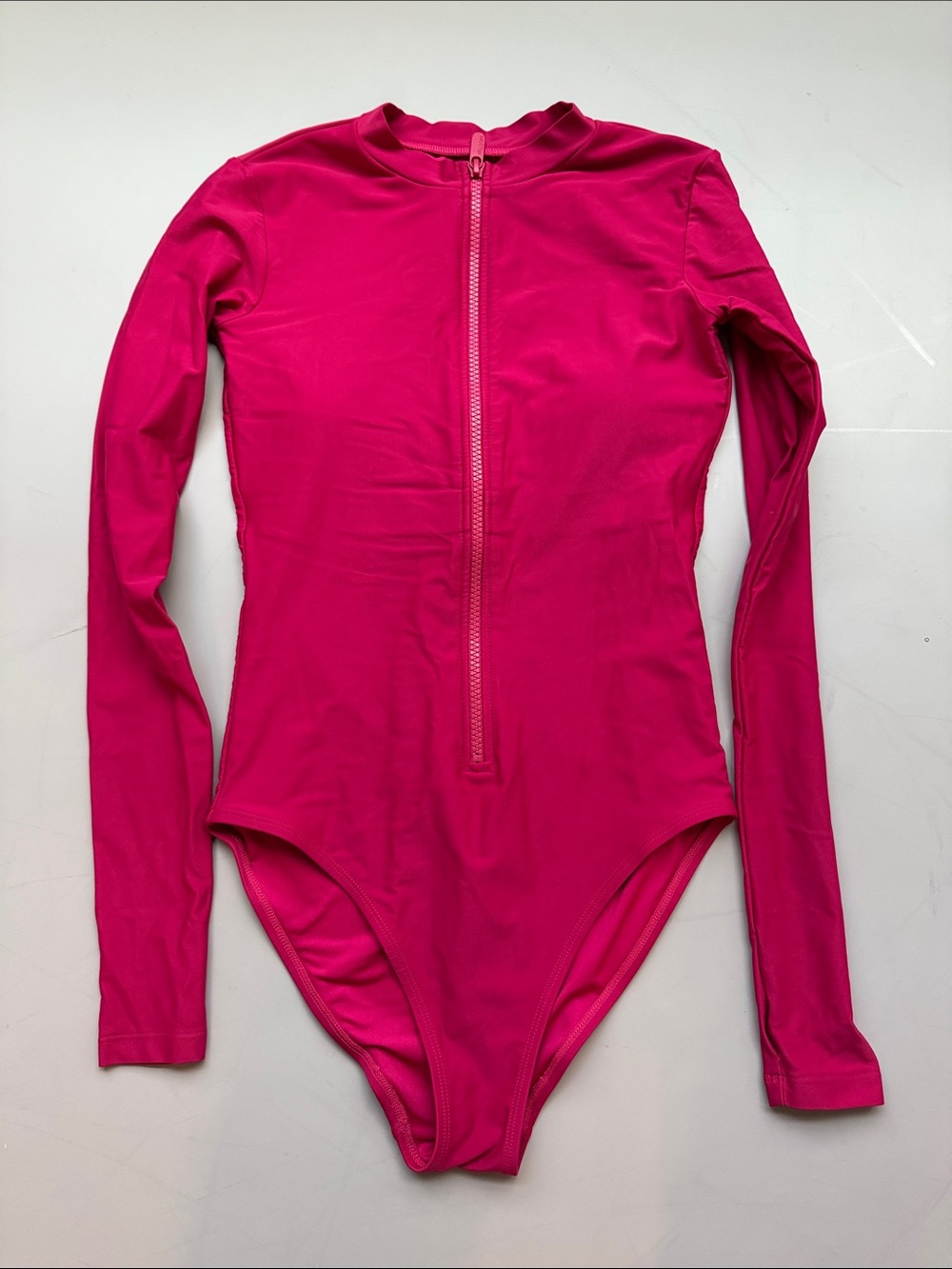 Mott50 UPF raspberry color long sleeve women’s swimsuit, size XS